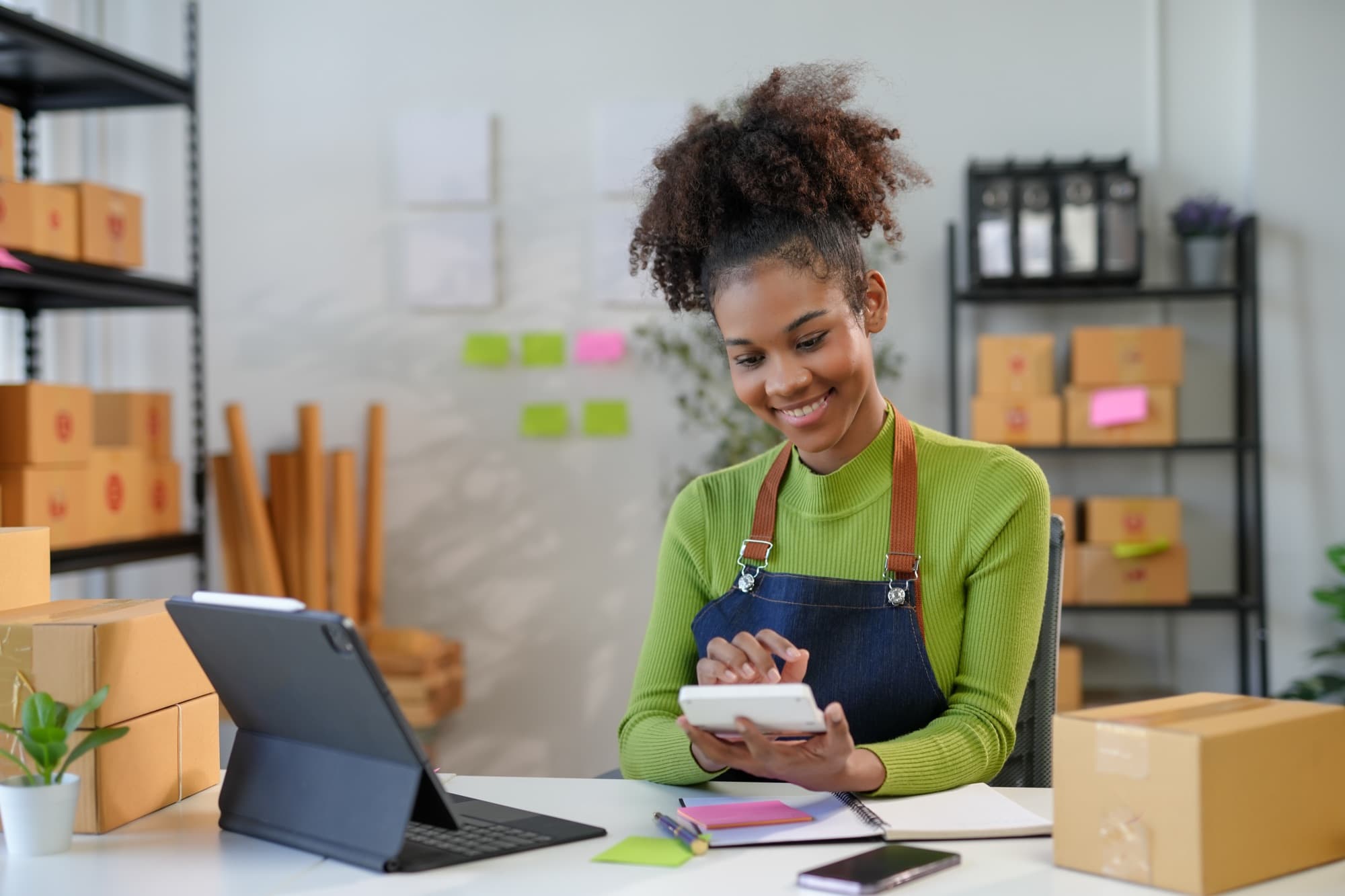 A small business owner reviewing orders